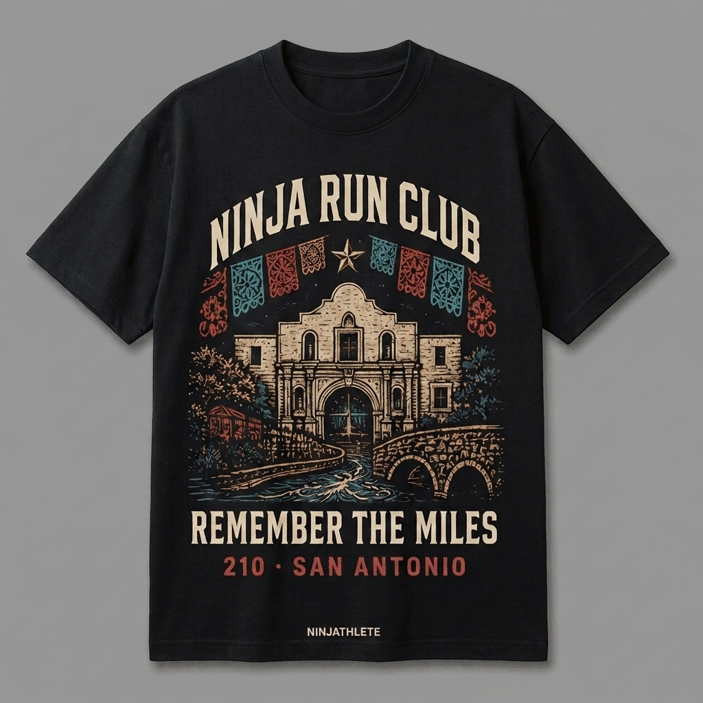 San Antonio 210 black oversized running t-shirt featuring the Alamo, River Walk bridges and papel picado details and the words Remember the Miles by Ninja Run Club